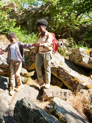 a family hiking and demonstrating rv leave no trace rules for kids